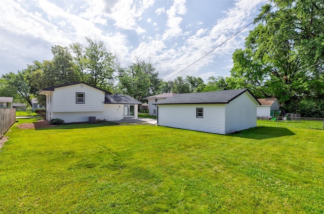 4132 E 24th Ct, Des Moines, IA 50317 - back of house featuring an outbuilding