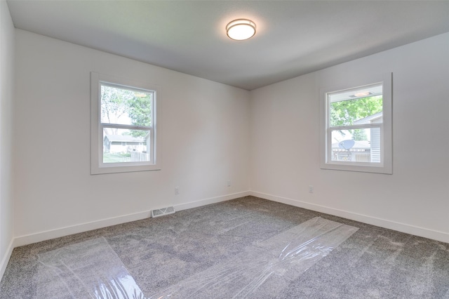 4132 E 24th Ct, Des Moines, IA 50317 - empty room featuring carpet floors