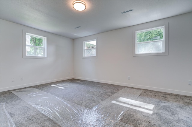 4132 E 24th Ct, Des Moines, IA 50317 - carpeted spare room with baseboards