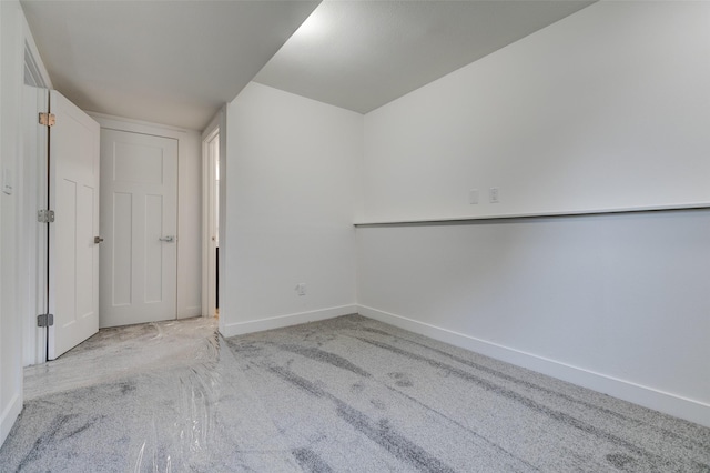 4132 E 24th Ct, Des Moines, IA 50317 - additional living space featuring baseboards and carpet