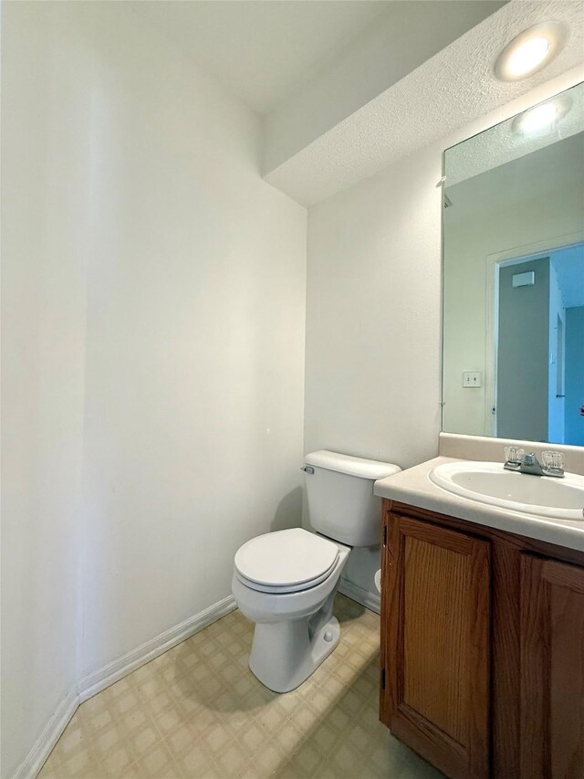 2519 W 1st St, Ankeny, IA 50023 - half bath featuring tile patterned floors and vanity
