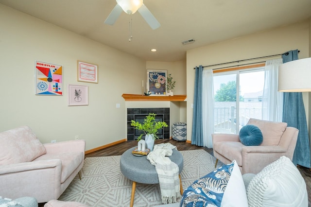 8601 Westown Pkwy Unit 18211, West Des Moines, IA 50266 - living room with wood finished floors, recessed lighting, a ceiling fan, and a tiled fireplace