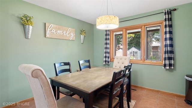 608 E 15th St N, Newton, IA 50208 - dining area featuring baseboards and tile patterned floors