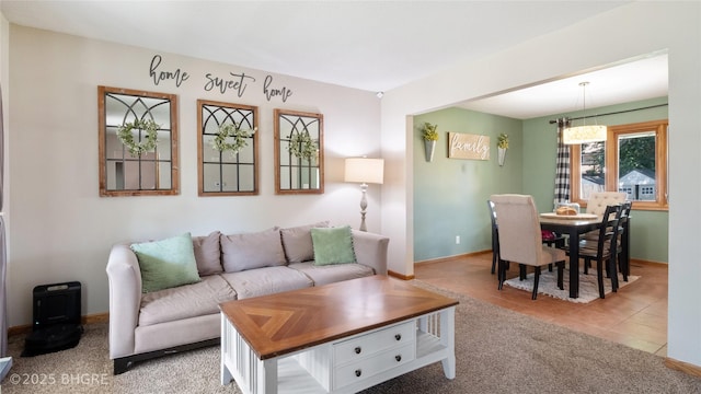608 E 15th St N, Newton, IA 50208 - living room with baseboards and tile patterned flooring