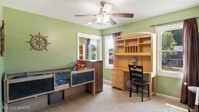 608 E 15th St N, Newton, IA 50208 - office area featuring light colored carpet and a ceiling fan