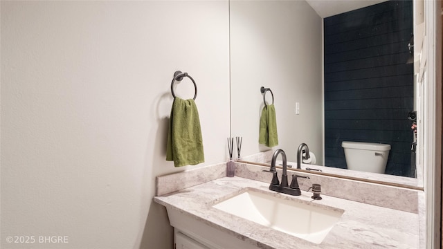 608 E 15th St N, Newton, IA 50208 - bathroom featuring vanity and toilet