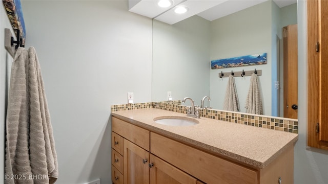 608 E 15th St N, Newton, IA 50208 - bathroom with decorative backsplash and vanity