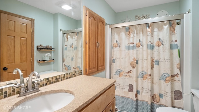 608 E 15th St N, Newton, IA 50208 - bathroom with vanity and a shower with shower curtain