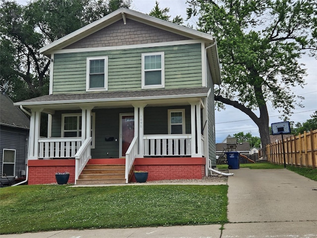1096 Buchanan St, Des Moines, IA 50316 - view of front of house featuring a porch and driveway