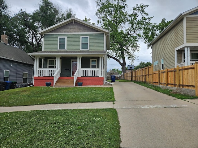 1096 Buchanan St, Des Moines, IA 50316 - american foursquare style home with driveway and covered porch