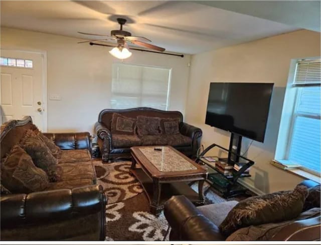 1096 Buchanan St, Des Moines, IA 50316 - living area featuring a ceiling fan and healthy amount of natural light