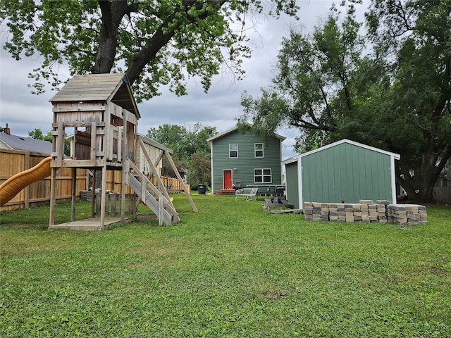 1096 Buchanan St, Des Moines, IA 50316 - view of yard with a playground and an outdoor structure