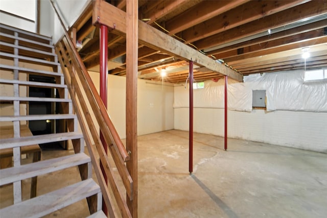 1228 64th St, West Des Moines, IA 50266 - below grade area featuring stairs and electric panel