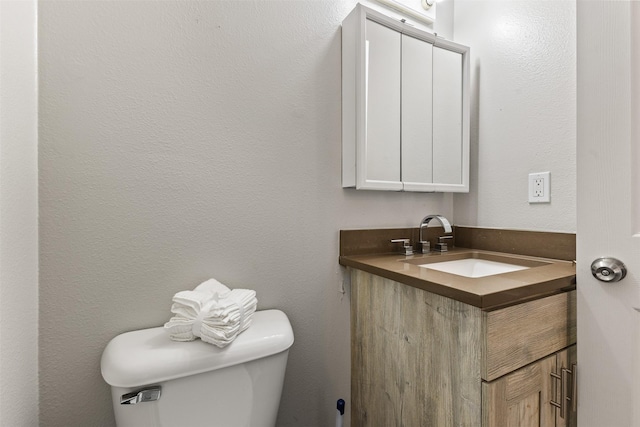 1913 E Bell Ave, Des Moines, IA 50320 - bathroom with toilet and vanity