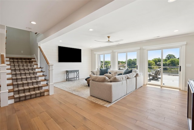 4387 Panorama Dr, Panora, IA 50216 - living area featuring plenty of natural light, ceiling fan, light wood-style flooring, stairway, and recessed lighting