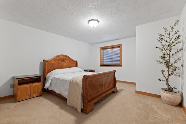 4315 129th St, Urbandale, IA 50323 - bedroom featuring light carpet and a textured ceiling