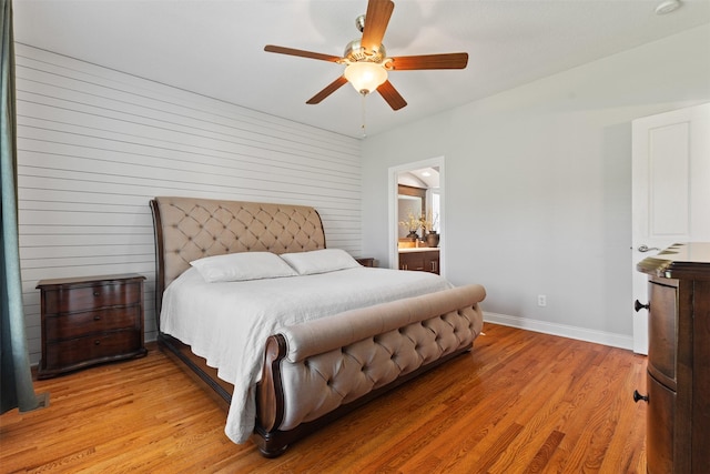 4315 129th St, Urbandale, IA 50323 - bedroom with light wood-style floors and a ceiling fan