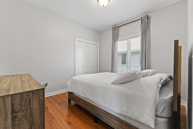 4315 129th St, Urbandale, IA 50323 - bedroom featuring wood finished floors and a closet