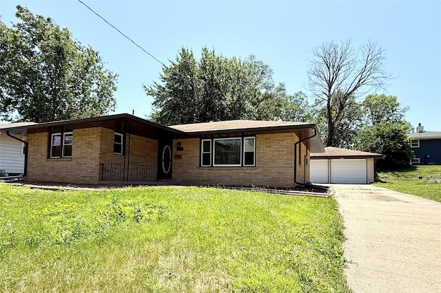3355 Kinsey Ave, Des Moines, IA 50317 - single story home featuring a front yard, brick siding, and a garage
