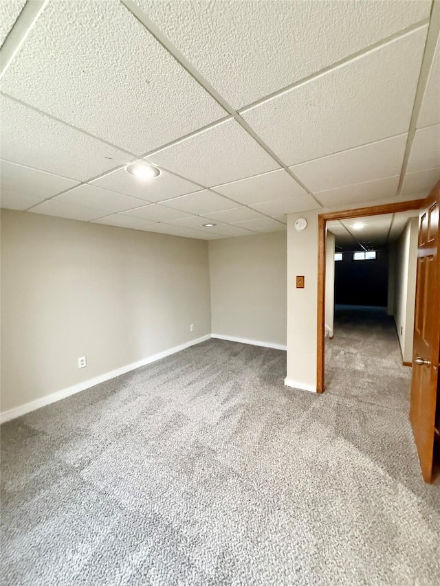 3355 Kinsey Ave, Des Moines, IA 50317 - finished basement featuring carpet floors and a drop ceiling