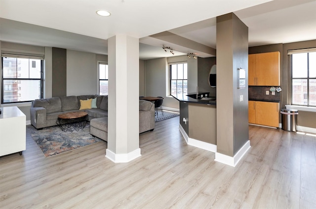 400 Walnut St Unit 901, Des Moines, IA 50309 - living area with light wood-type flooring, healthy amount of natural light, and recessed lighting