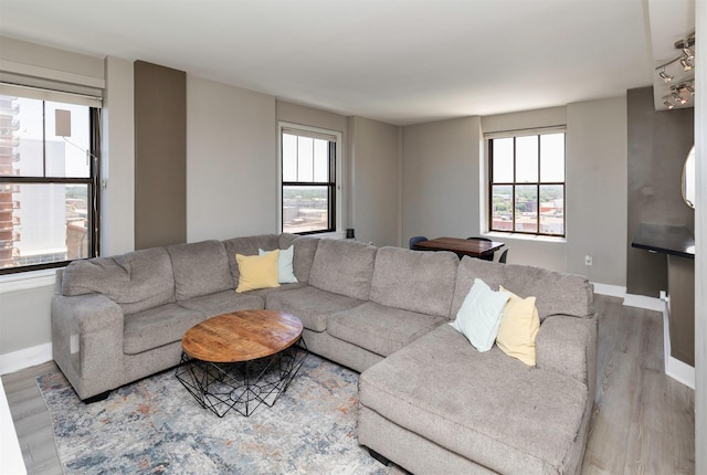 400 Walnut St Unit 901, Des Moines, IA 50309 - living room featuring wood finished floors and baseboards