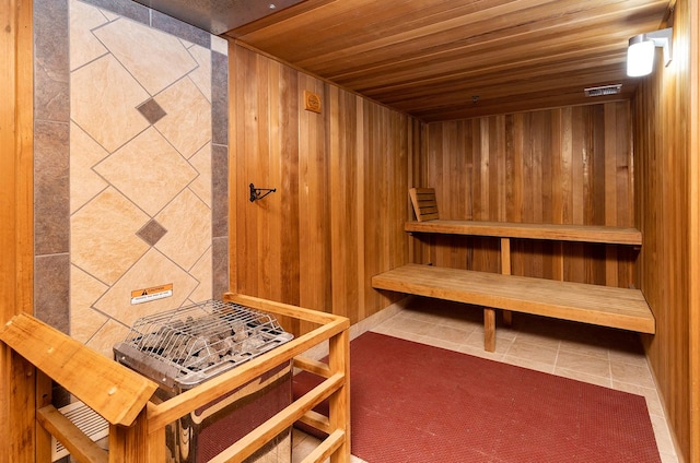 400 Walnut St Unit 901, Des Moines, IA 50309 - sauna / steam room featuring wood ceiling, tile patterned floors, and wood walls