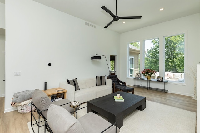 1286 Glen Oaks Dr, West Des Moines, IA 50266 - living room with a ceiling fan, light wood-type flooring, and recessed lighting