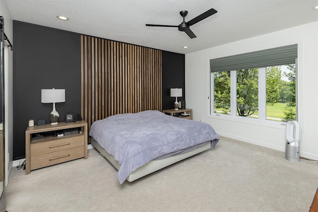 1286 Glen Oaks Dr, West Des Moines, IA 50266 - bedroom with light colored carpet, recessed lighting, a ceiling fan, and a textured ceiling