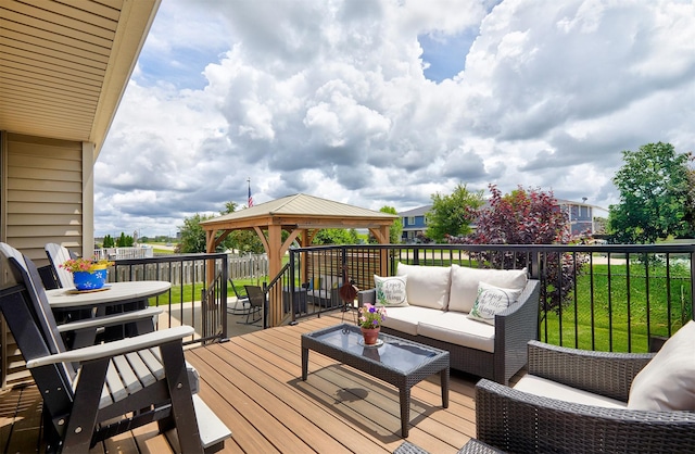 690 SE Driftwood Ln, Waukee, IA 50263 - wooden deck with outdoor lounge area and a gazebo