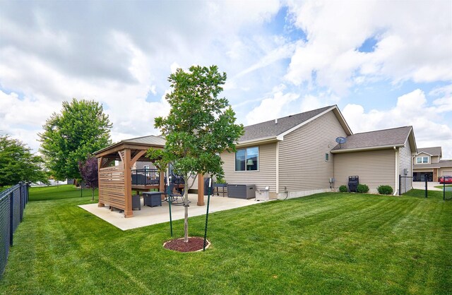 690 SE Driftwood Ln, Waukee, IA 50263 - back of property featuring a gazebo and a patio area