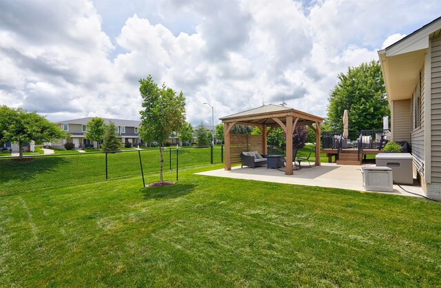 690 SE Driftwood Ln, Waukee, IA 50263 - view of yard featuring a patio, a gazebo, outdoor lounge area, a deck, and a residential view