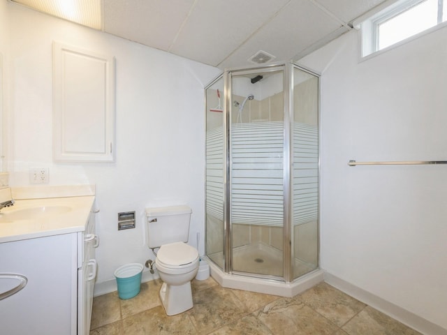 3918 11th St, Des Moines, IA 50313 - full bathroom featuring a shower stall, vanity, and tile patterned flooring