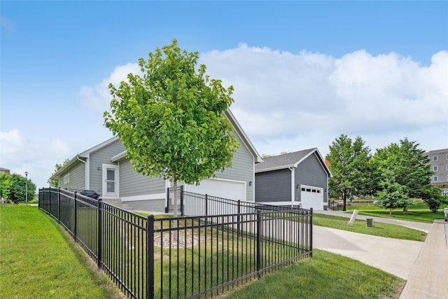 523 S Bluestone Way W, Des Moines, IA 50266 - view of front of house with an attached garage and concrete driveway