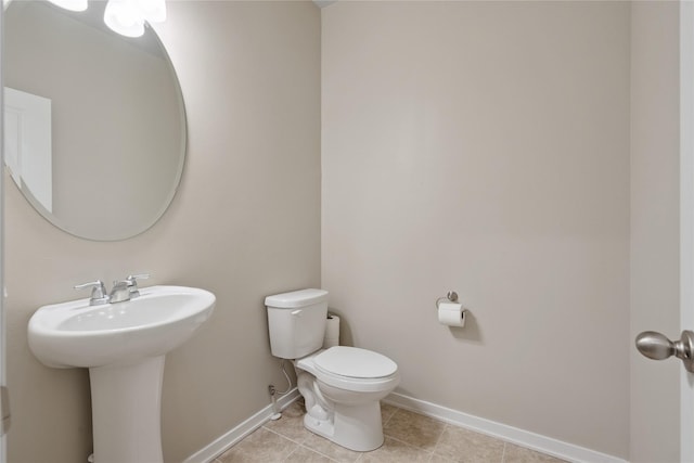 523 S Bluestone Way W, Des Moines, IA 50266 - half bath featuring toilet and tile patterned floors