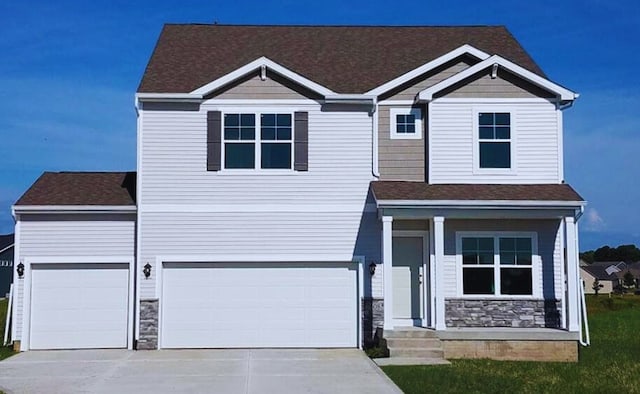2610 13th Ave SE, Altoona, IA 50009 - craftsman-style house featuring stone siding, concrete driveway, a garage, and a shingled roof