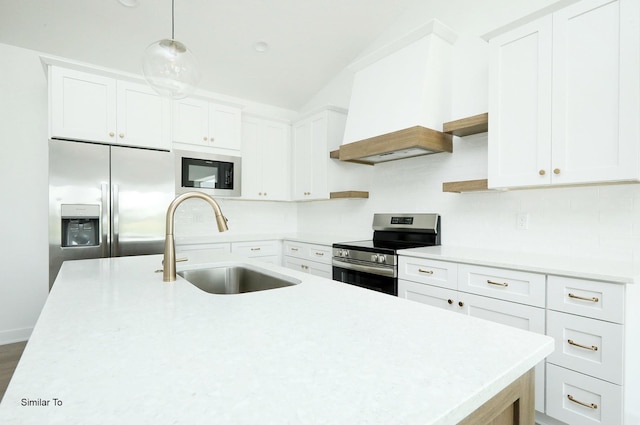 2410 NE 6th St, Grimes, IA 50111 - kitchen featuring appliances with stainless steel finishes, backsplash, white cabinetry, and light countertops