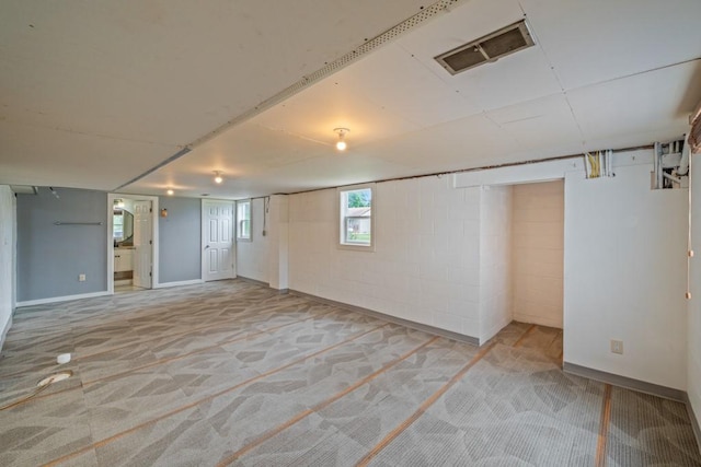 2560 E Sheridan Ave, Des Moines, IA 50317 - basement featuring carpet floors