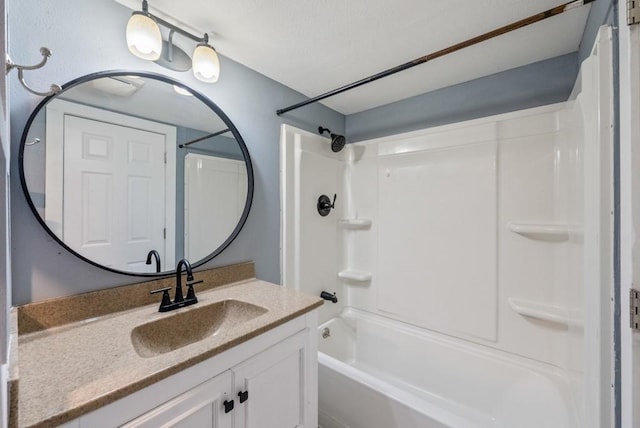2560 E Sheridan Ave, Des Moines, IA 50317 - bathroom featuring bathtub / shower combination and vanity