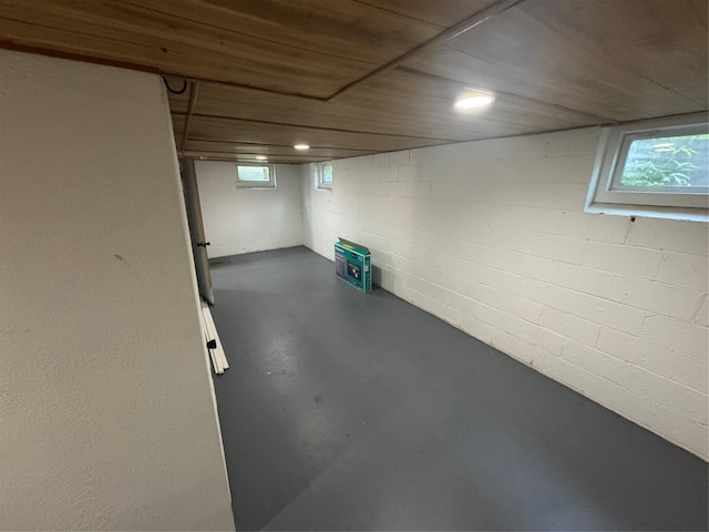 1008 Kingman Dr, Des Moines, IA 50311 - basement featuring healthy amount of natural light and concrete block wall
