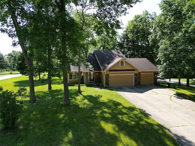 6020 NE 9th St, Des Moines, IA 50313 - view of front facade with a garage, driveway, and a front yard