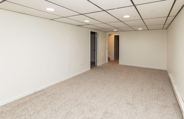 424/426 E Leach Ave, Des Moines, IA 50315 - empty room featuring recessed lighting, carpet, and a baseboard radiator