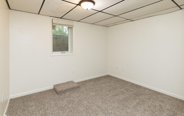 424/426 E Leach Ave, Des Moines, IA 50315 - unfurnished room featuring carpet floors and a paneled ceiling