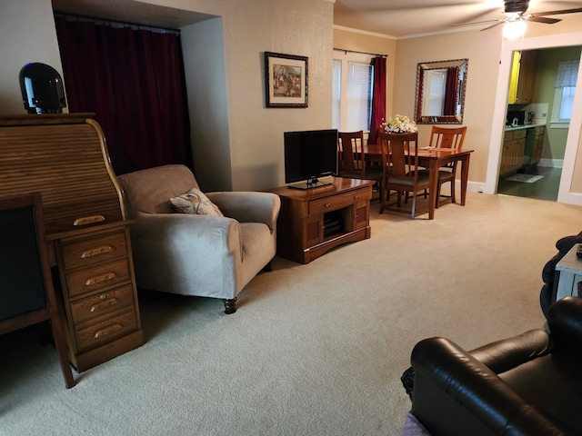 2730 53rd St, Des Moines, IA 50310 - living room with light colored carpet, ceiling fan, and crown molding