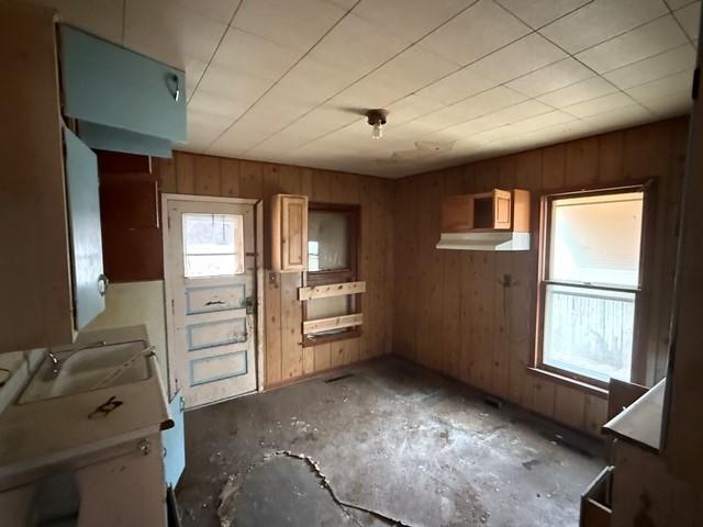 603 N 1st Ave, Marshalltown, IA 50158 - kitchen with healthy amount of natural light and wood walls