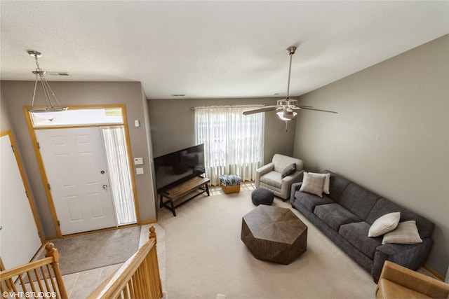 200 Walnut Dr NW, Bondurant, IA 50035 - carpeted living area featuring a ceiling fan