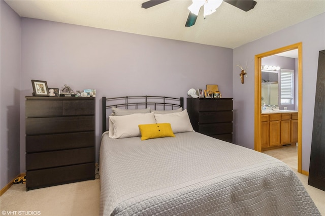 200 Walnut Dr NW, Bondurant, IA 50035 - bedroom featuring light colored carpet, ceiling fan, and connected bathroom