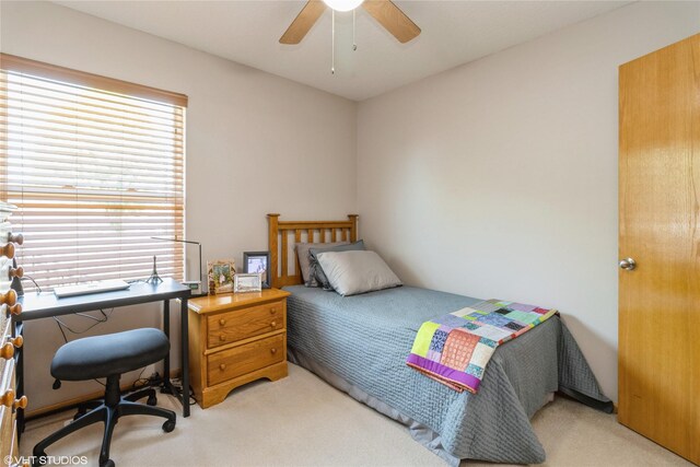 200 Walnut Dr NW, Bondurant, IA 50035 - bedroom featuring light carpet and ceiling fan