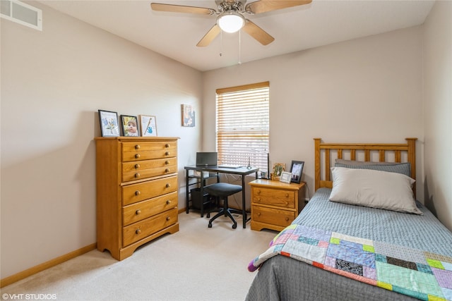200 Walnut Dr NW, Bondurant, IA 50035 - bedroom featuring light colored carpet, ceiling fan, and an office area