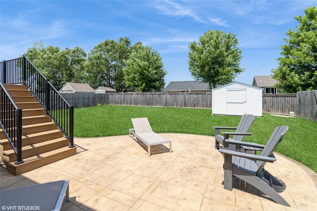 200 Walnut Dr NW, Bondurant, IA 50035 - fenced backyard with a patio, stairs, and a storage unit